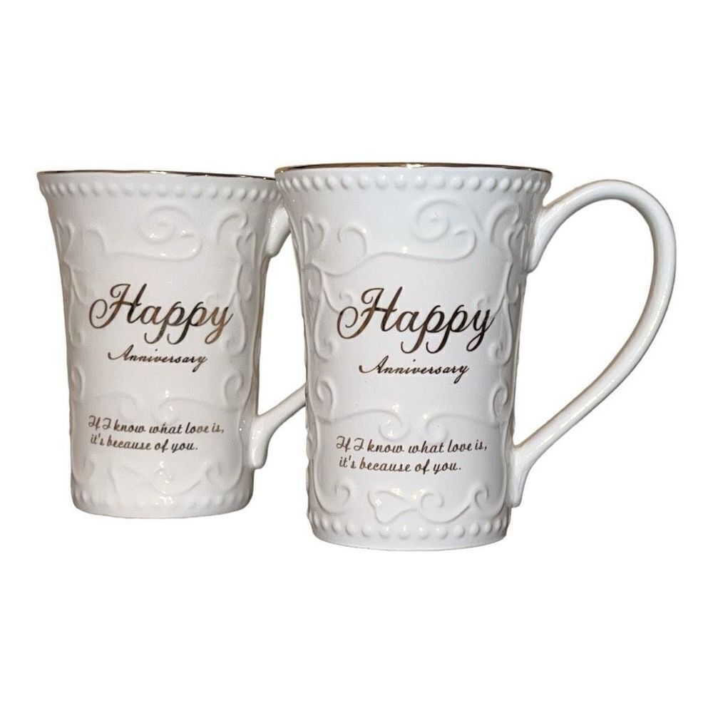 Set up two ￼ happy anniversary mugs